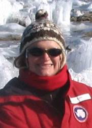 A person wearing a hat and sunglasses

Description automatically generated