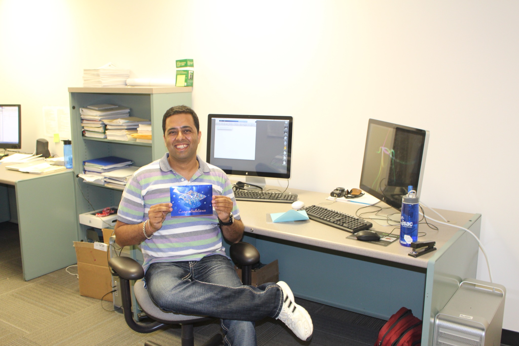 Mukesh Dhamala seated in an office